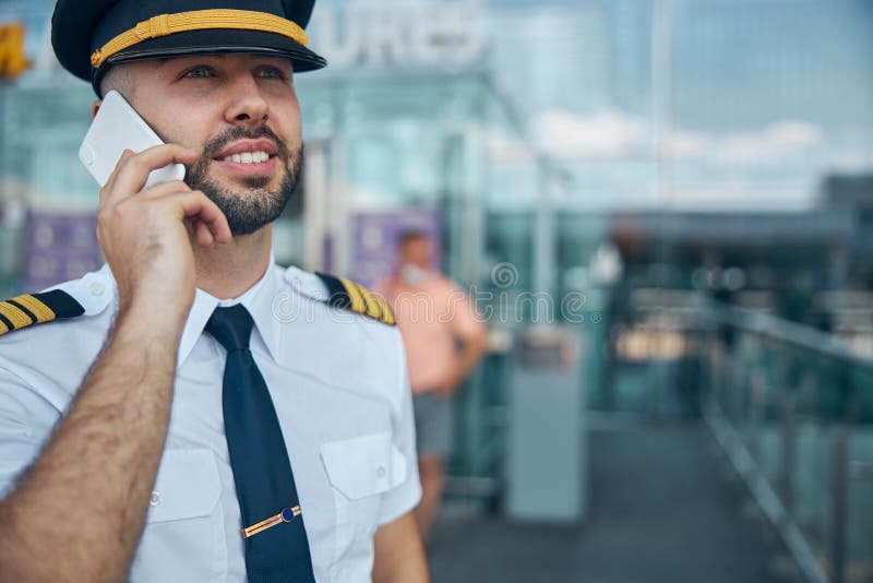 Handsome Male Pilot Standing on the Street Stock Image Handsome Male Pilot Standing on the Street Stock Image