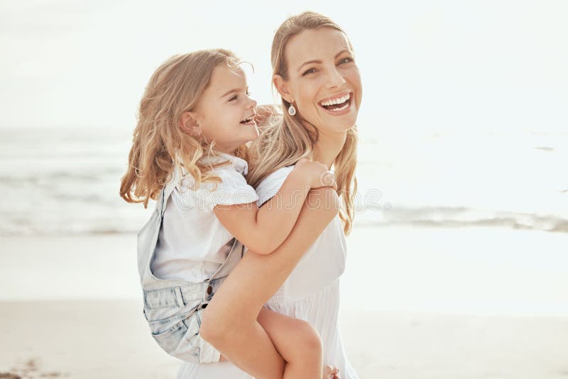 Portrait of young mother giving her son a piggyback ride, Stock Photo,  Picture And Royalty Free Image. Pic. WES-DGOF00925