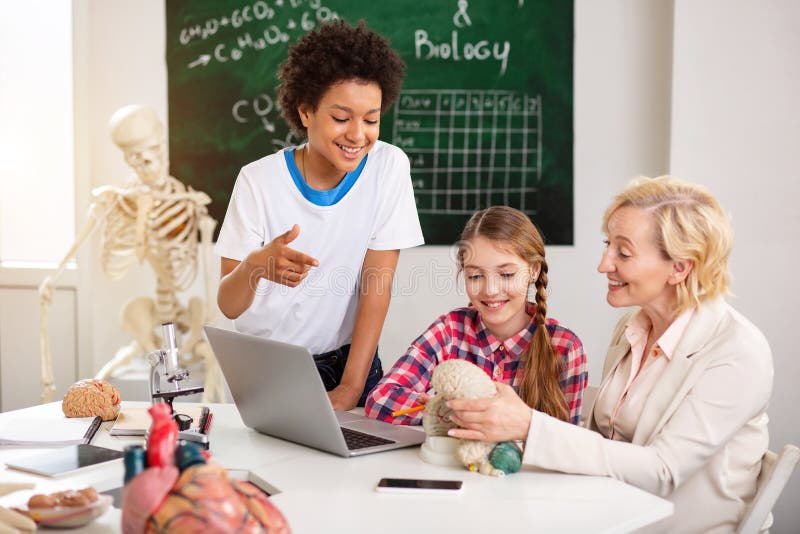 Cheerful Positive Boy Pointing at the Brain Model Stock Image - Image ...