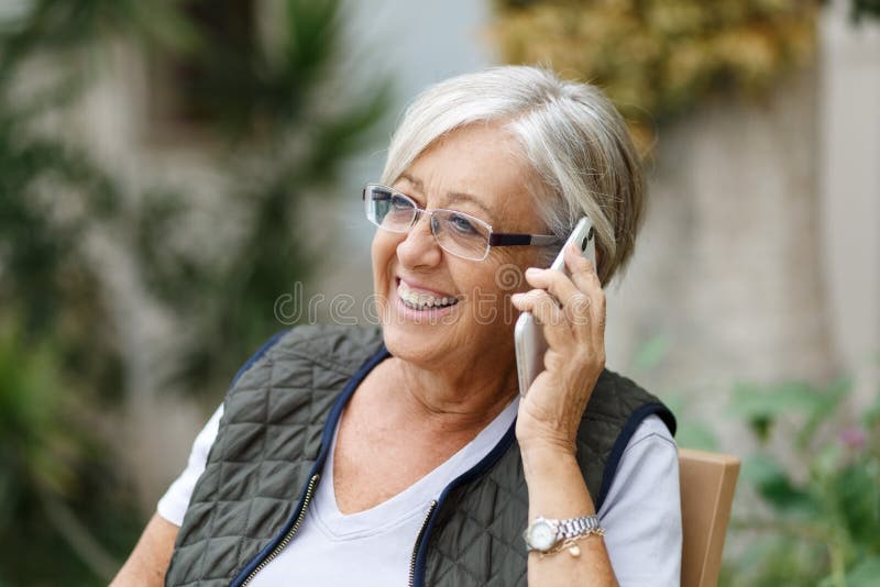 Cheerful Senior Woman Talking On Mobile Phone Elderly Lady Enjoying