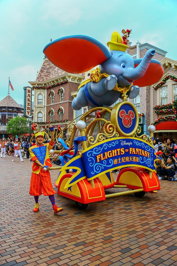 Disney flights of fantasy parade at disneyland, hong kong. Cheerful visitors watching the fun filled disney flights of fantasy parade at main street of stock image Disney flights of fantasy parade at disneyland, hong kong. Cheerful visitors watching the fun filled disney flights of fantasy parade at main street of stock image