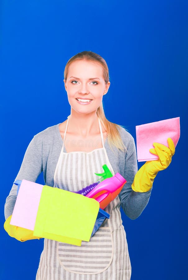 Cheerful Woman is Cleaning Something with Wisp and Spray Attentively