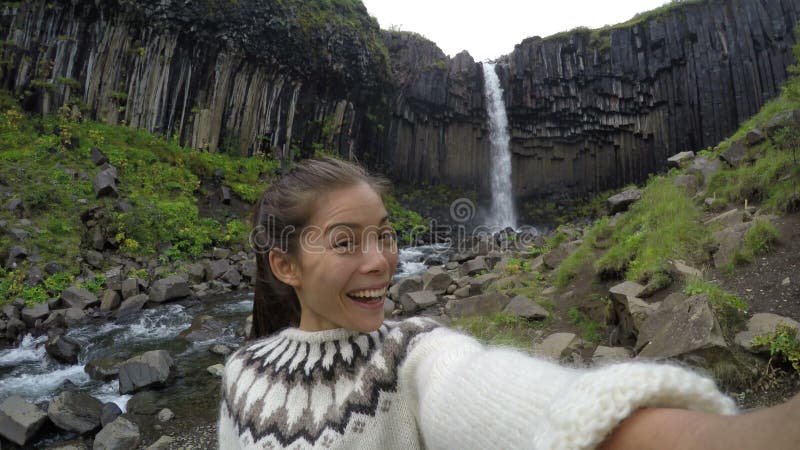 Cheerful Woman Enjoying At Svartifoss Waterfall - Girl Exercising In Summer