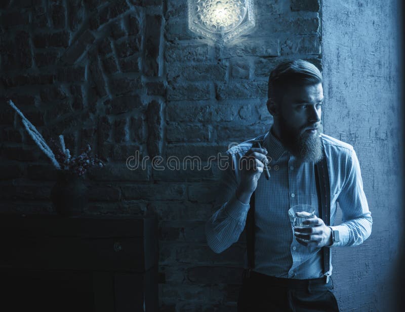 Download Cheerful Young Businessman Is Resting At Home Stock Photo - Image of boss, modern: 67441996