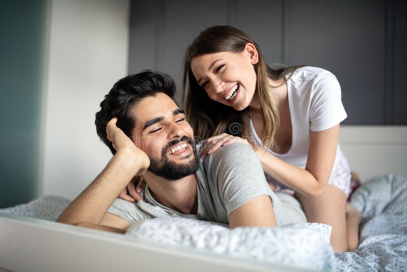 Cheerful Young Couple Making Massage at Home Stock Image - Image of  massage, love: 160089033