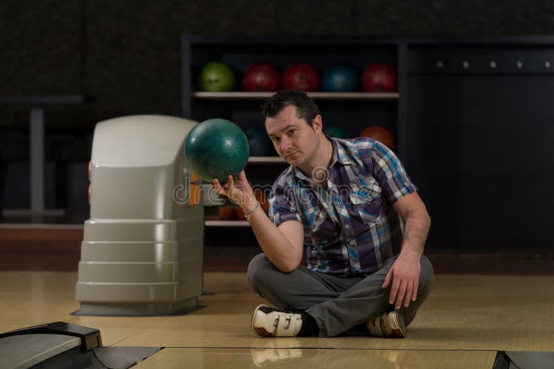 Cheerful Young Man Holding Bowling Ball Stock Photo Image of ball