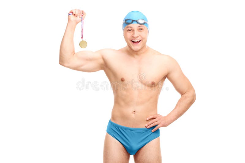 Cheerful young swimmer holding a medal royalty free stock photography Cheerful young swimmer holding a medal royalty free stock photography
