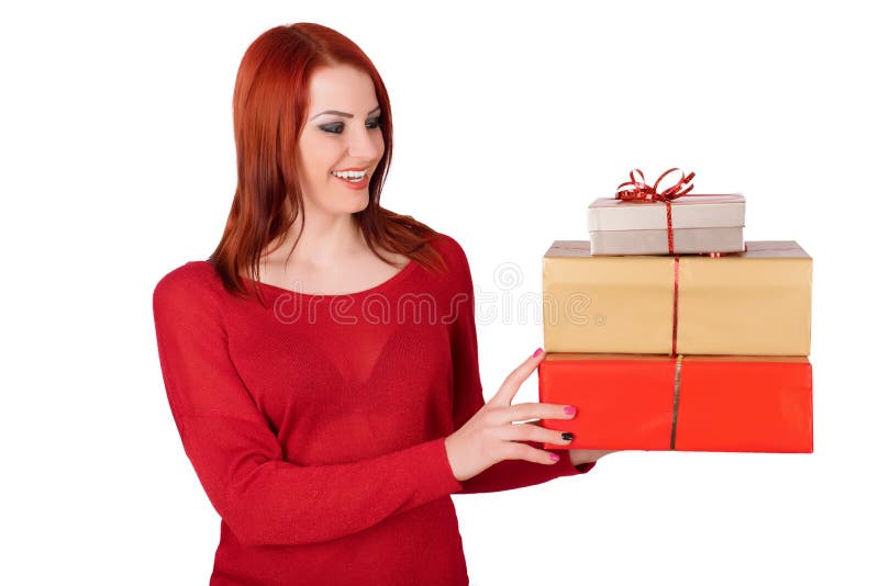 Cheerful woman holding small gift box isolated on a white background