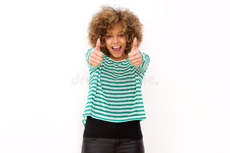 Cheerful young woman smiling with thumbs up hand sign