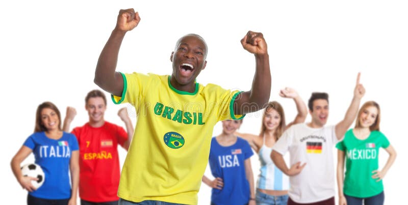 Cheering sports fan from Brazil with fans from other countries royalty free stock photos Cheering sports fan from Brazil with fans from other countries royalty free stock photos