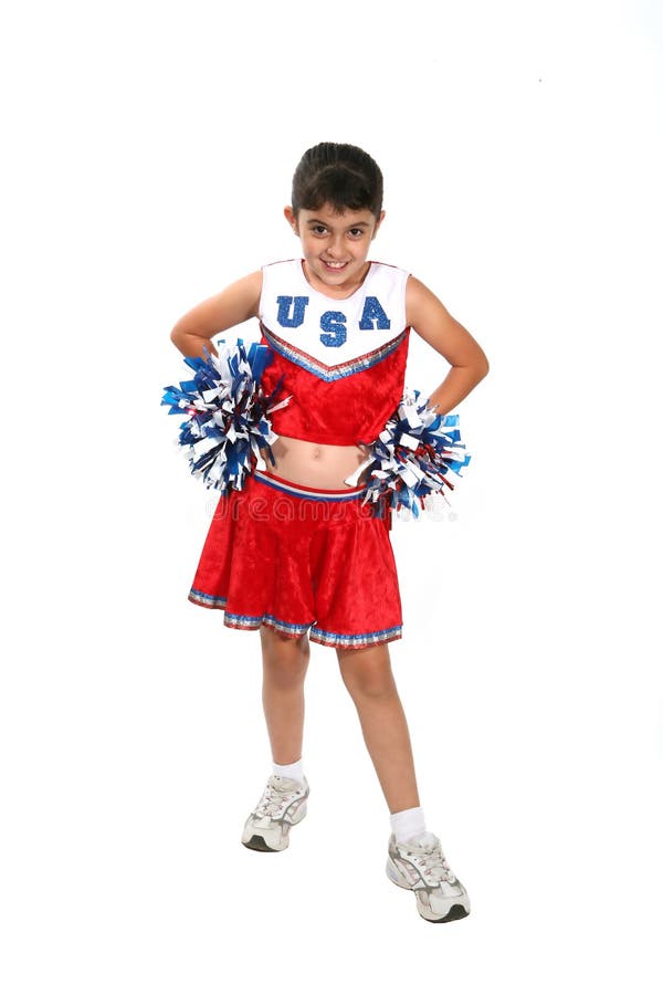 Nine Year Old Caucasian Girl Dressed in a Blue Cheerleader Outfit Stock