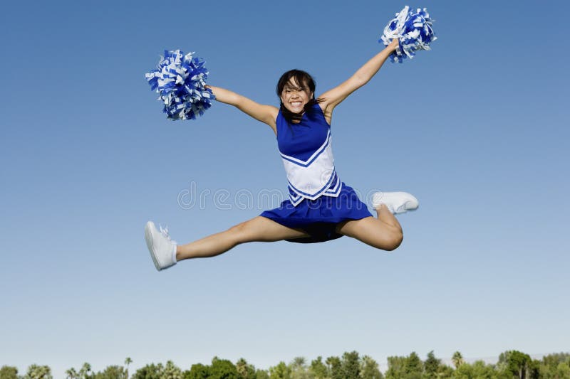 Cheerleaders Holding PomPoms Stock Image Image of team, cheerleader