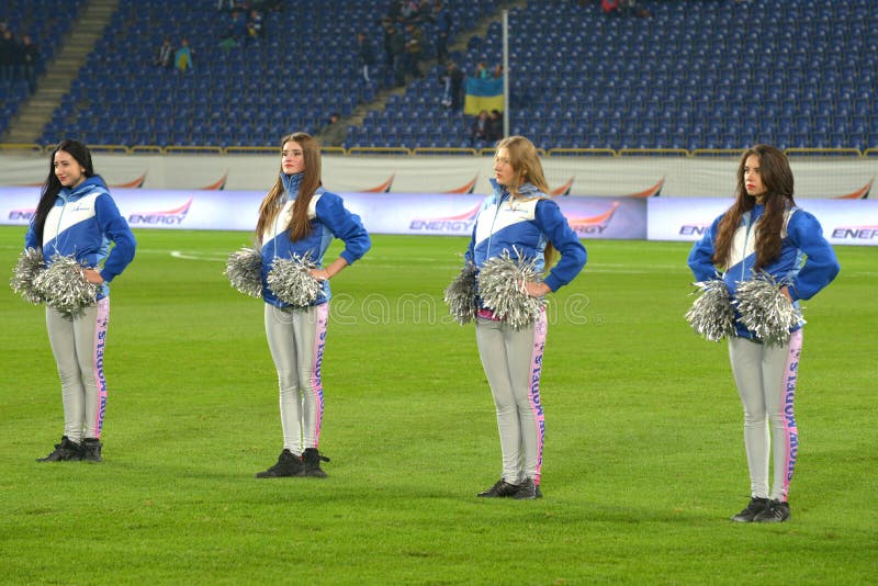 cheerleaders in a line photo was taken during the match between fc dnipro dnipropetrovsk city and fc olimpik donetsk city at. cheerleaders in a line photo was taken during the match between fc dnipro dnipropetrovsk city and fc olimpik donetsk city at
