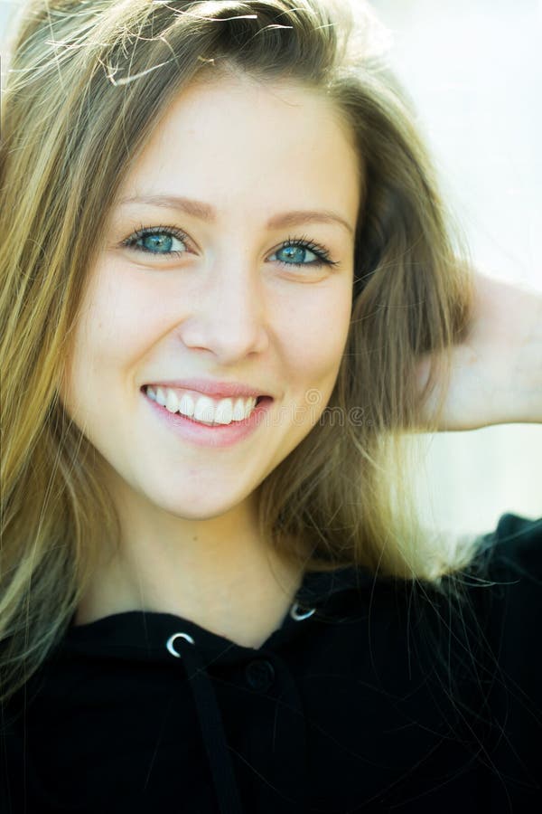 Pretty Joyful Young Girl with Long Hair on Pink Background. Lovely ...