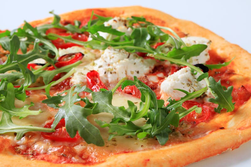 Cheese and arugula pizza