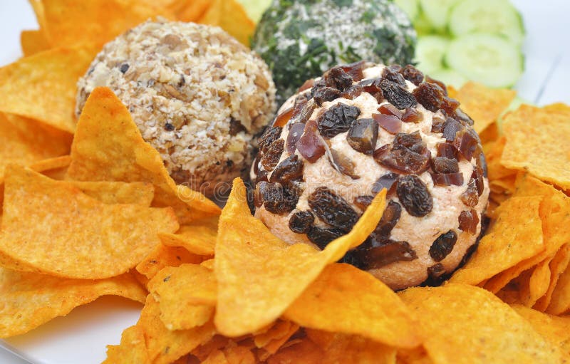 Cheese Ball Bonanza Powdery orange salty snack goodness. Yummy snack. Junk  food. Treat. Delicious background. Throwback food. Stock Photo