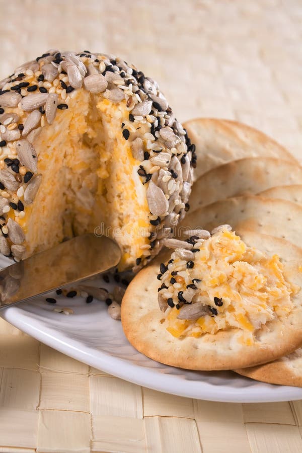 Cheese Ball & Crackers stock image. Image of sesame 14615643