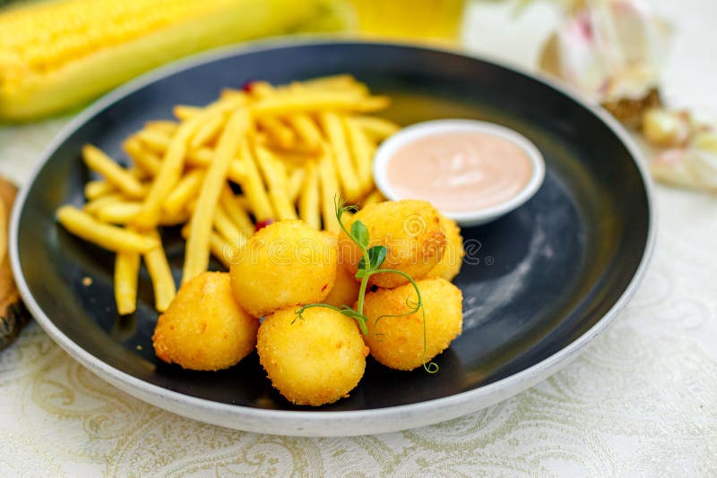 Deep fried cheese balls with sauce on white background Stock Photo by  ©RootsB4Branches 99676918