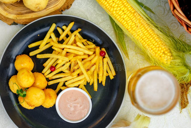 Cheese Balls with French Fries and Sauce Stock Image - Image of tasty,  snack: 180112499