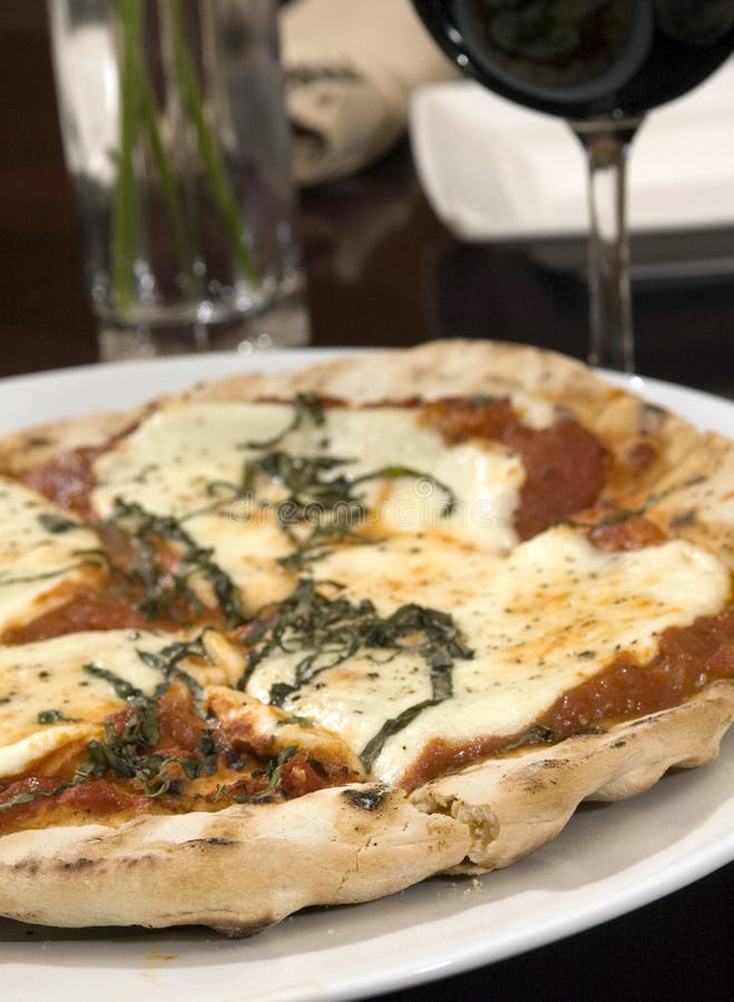 Cheese and basil pizza stock photo. Image of marinara 6070964
