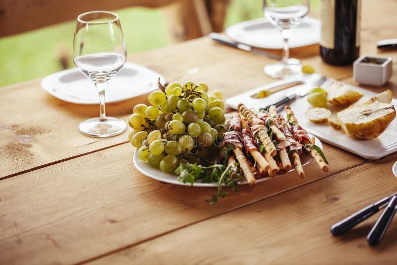 Cheese Board and Red Wine stock image. Image of bright 118439931