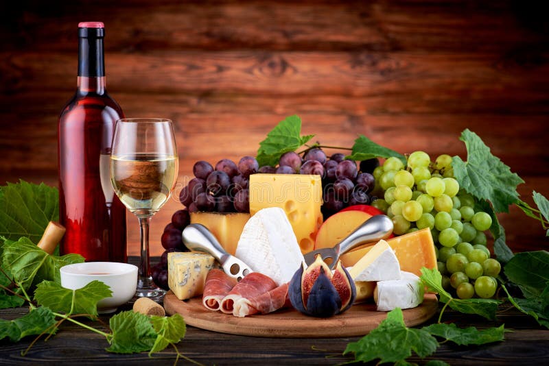 Cheese board and wine stock image. Image of sweet, yellow 89497591