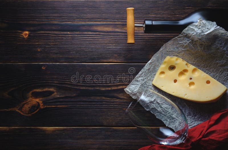 Cheese bottle of wine and a glass. Copy space royalty free stock photography Cheese bottle of wine and a glass. Copy space royalty free stock photography