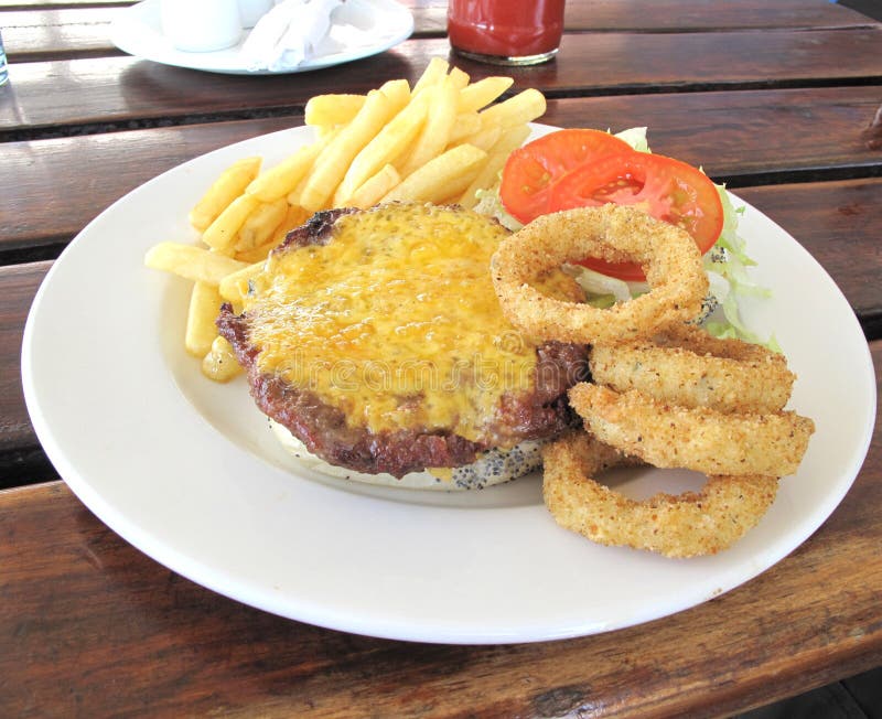Cheese burger and fries stock photo