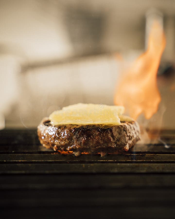 Cheese burger on a grill stock image. Image of french 191474637