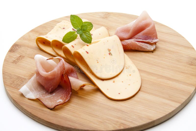 Cheese chopped with ham stock image. Image of plate, wood 21602437