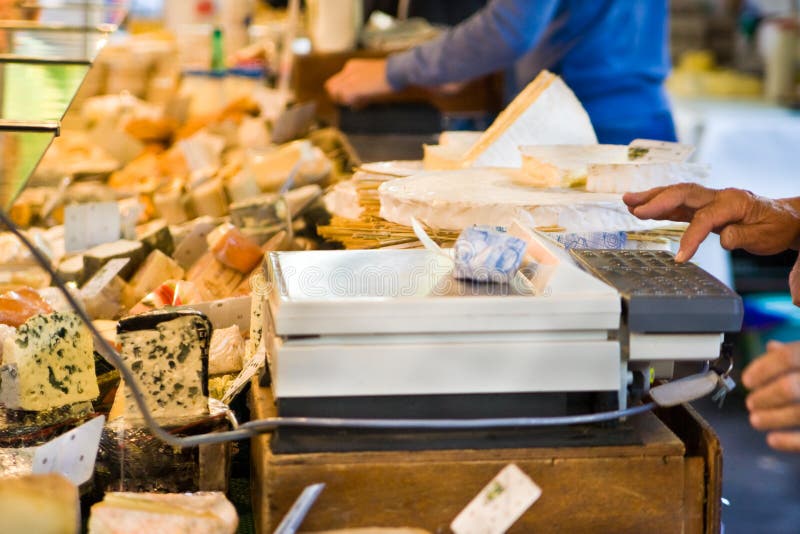 Cheese counter on a market in France. Food vendor sold stock images, royalty-free photos and pictures