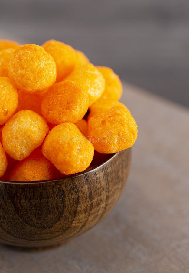 Puffed Ball Cheese Corn Chips In Gray Bowl And Sprinkled Isolated On White  Background Stock Photo - Download Image Now - iStock