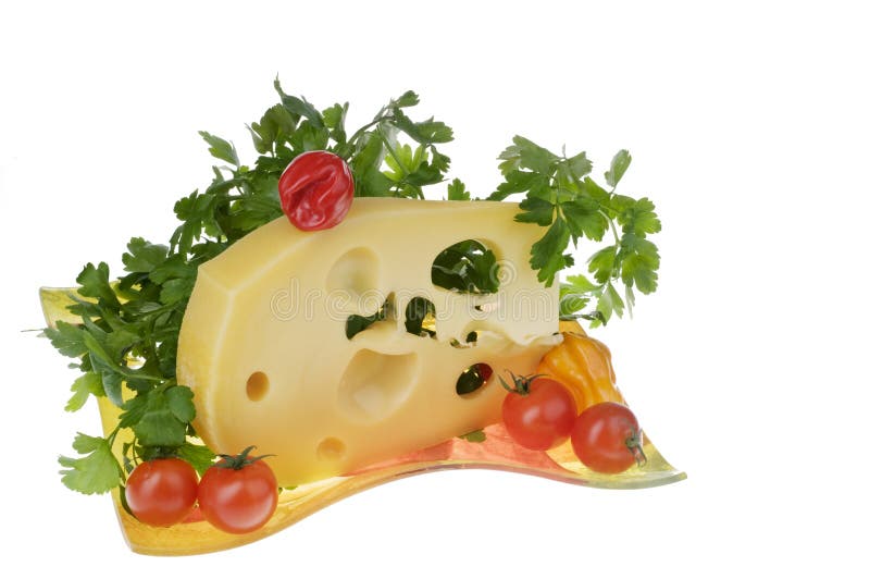 Cheese food with vegetables over white.