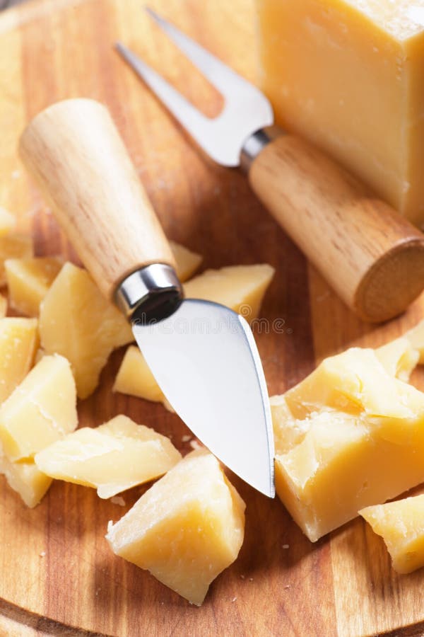 Cheese knife and fork stock image. Image of photograph 60435019