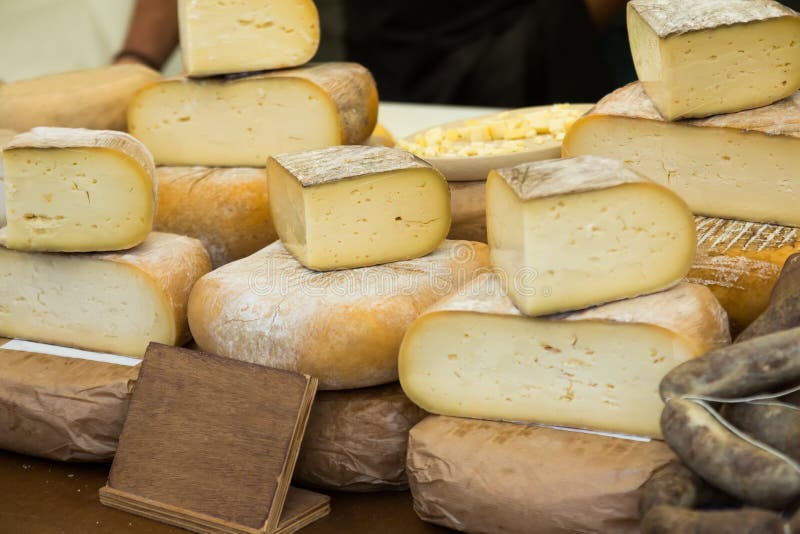 Cheese at market counter stock photo. Image of cheese 59674938