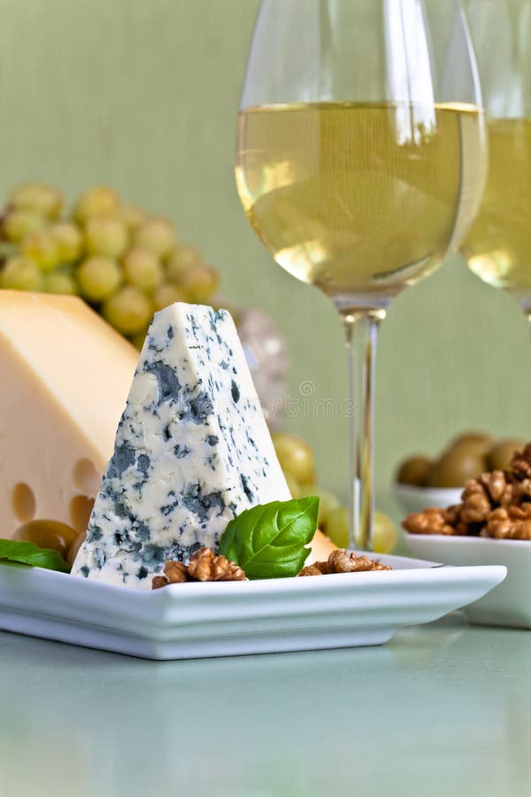 Cheese with nuts and wine stock photo. Image of summer 58852094