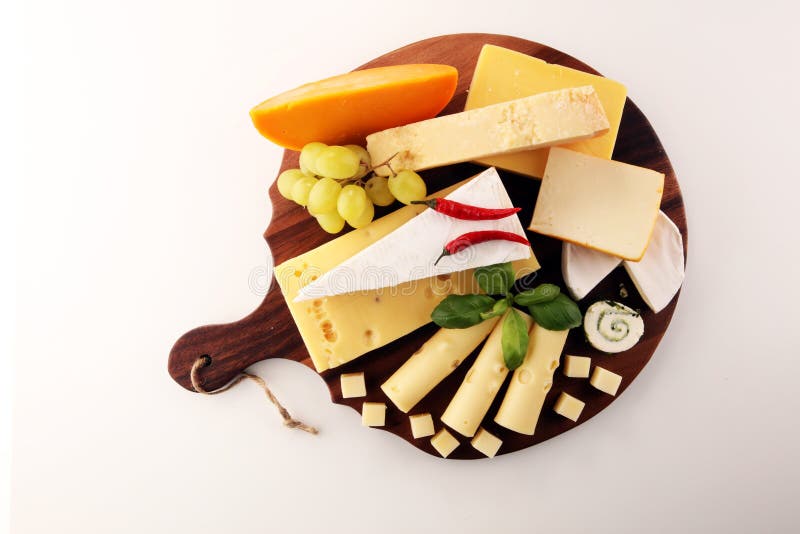 Cheese Plate Served with Grapes, Various Cheese on a Platter Stock