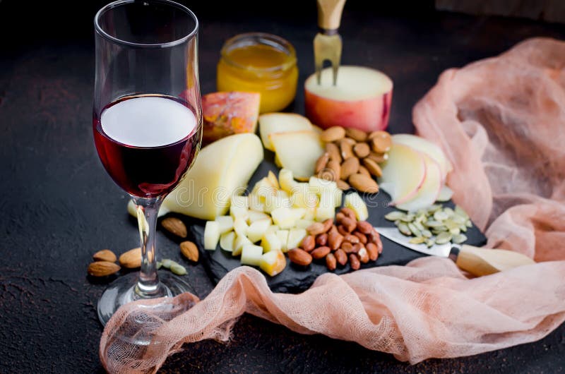 Cheese Platter and Glass of Red Wine Stock Photo Image of group