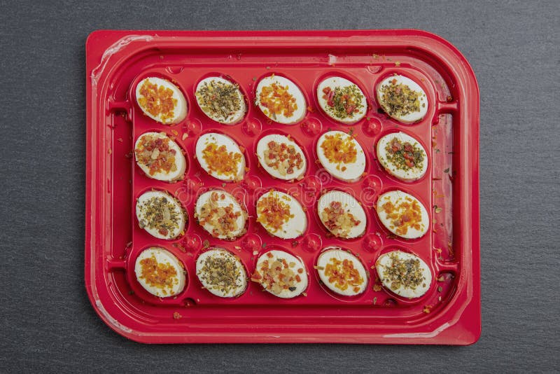 Cheese Platter. Mazzarella Cheese with Different Spices Stock Image