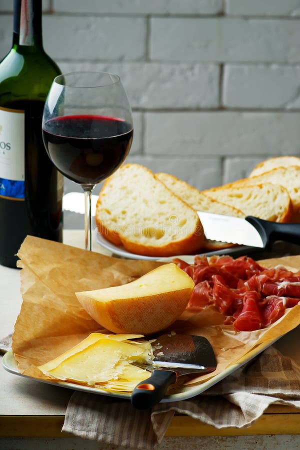 Cheese, Prosciutto, Bread and Red Wine. Stock Photo Image of drink