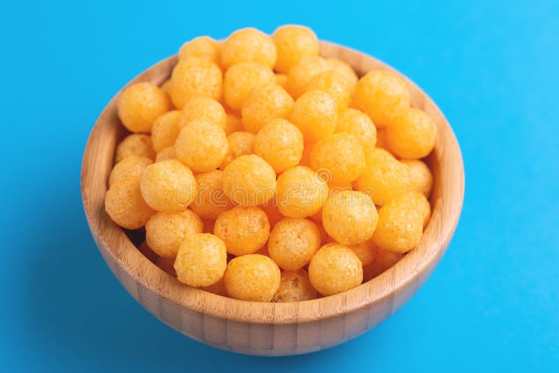 Cheese Puff Balls in Wooden Bowl on Light Background Stock Image - Image of  fried, cereal: 133510255