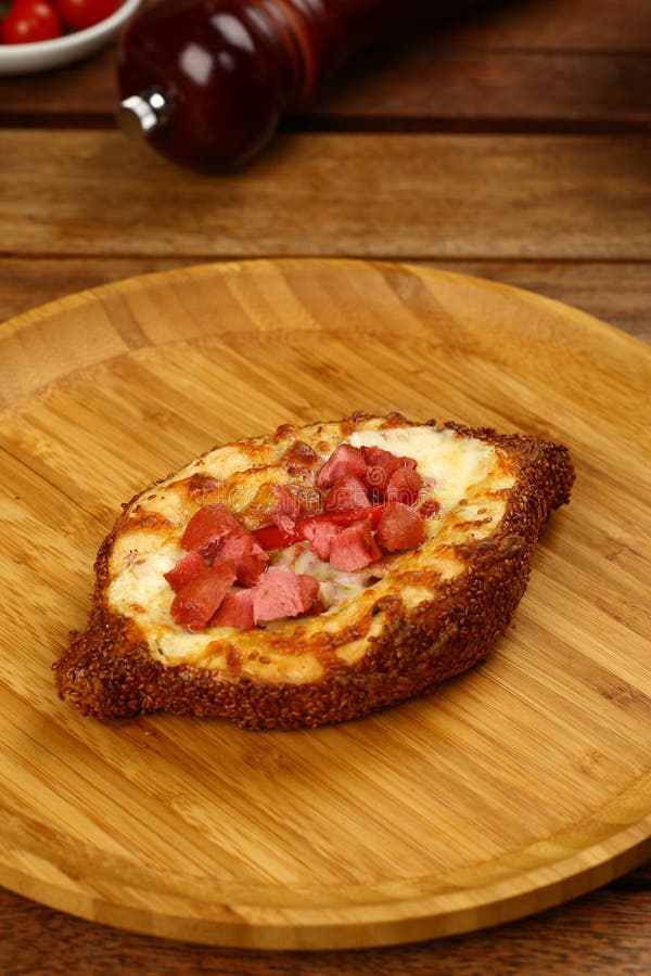 Cheese and sausage sesame simit stock photos