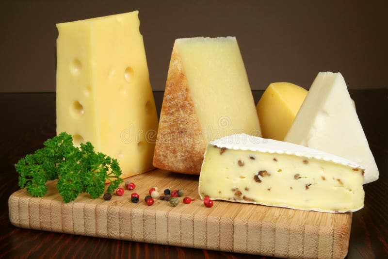 Cheese serving stock photo. Image of parsley, board, pepper 7854470