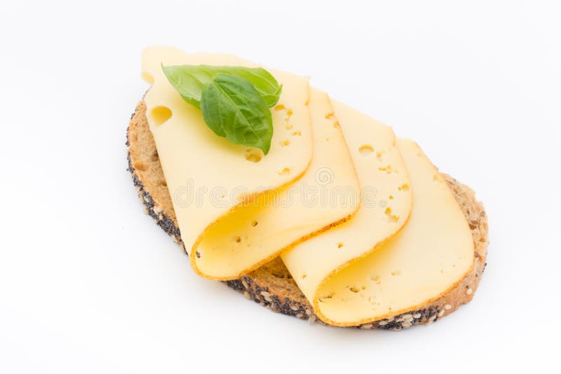 Cheese slices on bread. White background