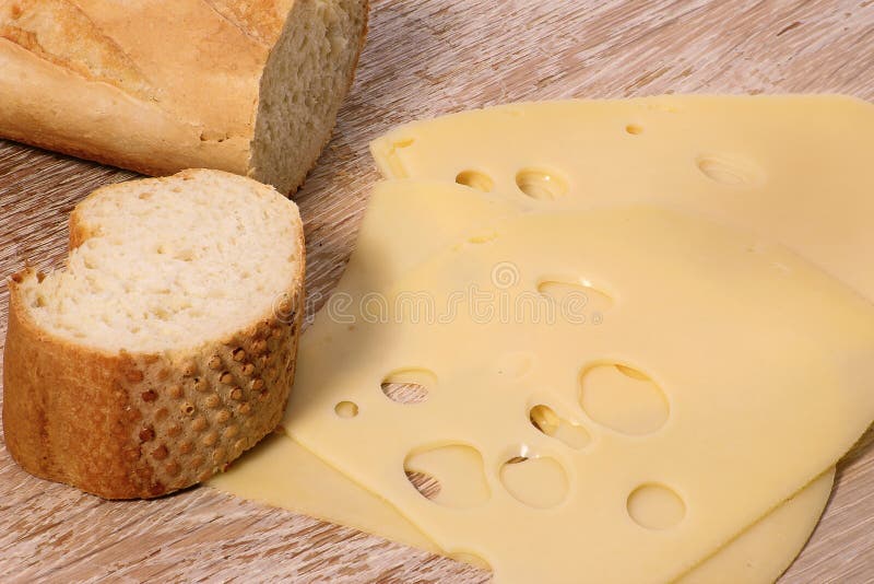 Cheese Slices with French Bread Stock Photo Image of board, bread