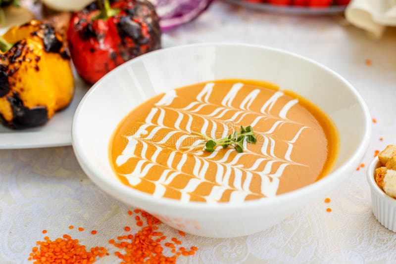 Cheese Soup with Crackers, Healthy Food on a Decorated Table Stock