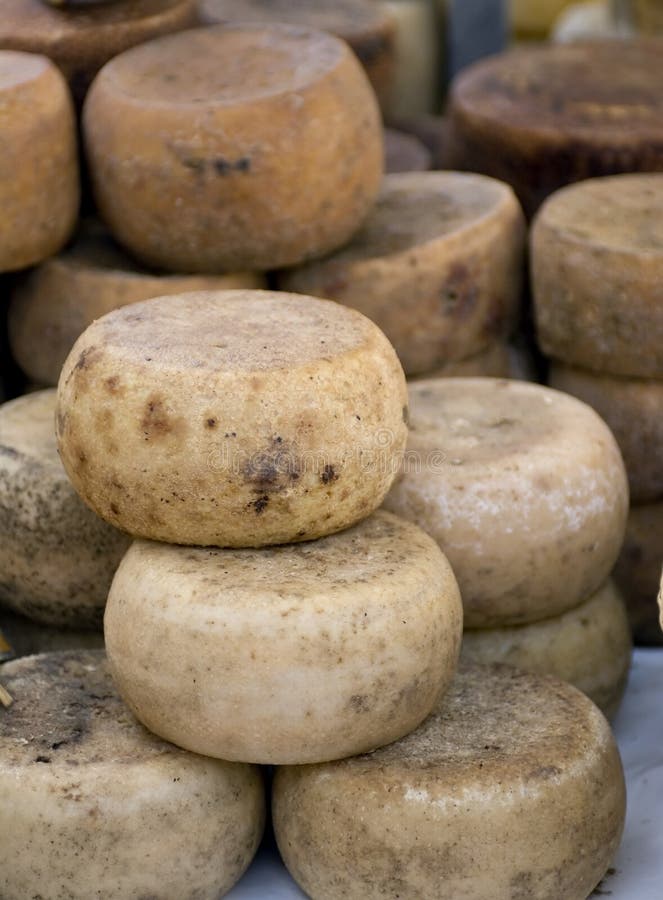 Cheese wheels stock image. Image of food, pile, wheel 1276659