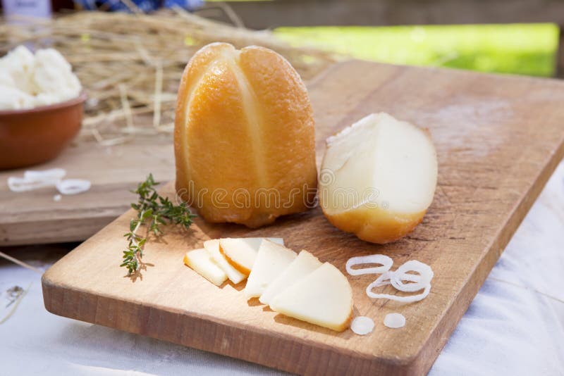 Cheese on wooden board.