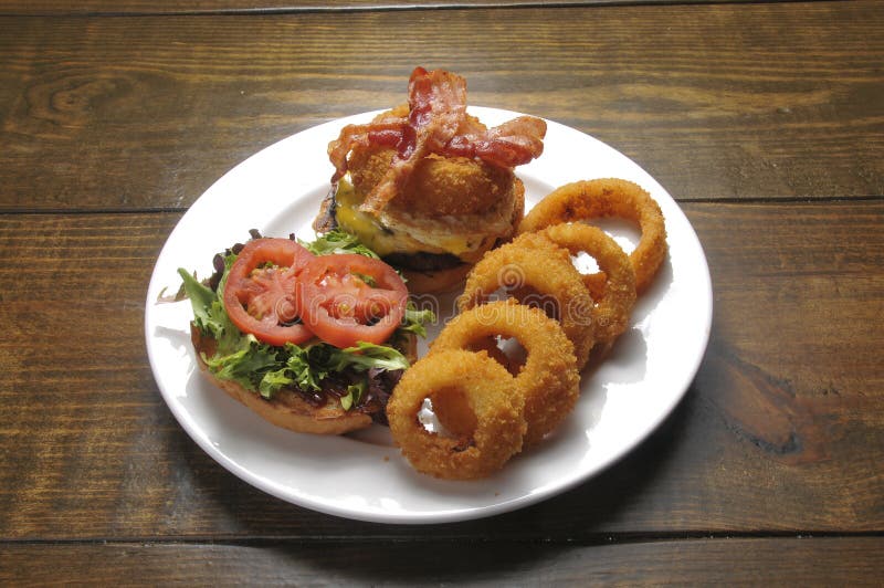 Cheeseburger and Onion Rings Stock Image Image of charbroiled