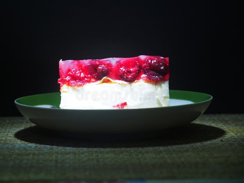 Cheesecake with Cherry Jelly is on the Saucer Stock Photo Image of